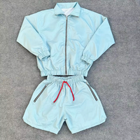 Ensemble coupe-vent unisexe deux pièces avec cordon de serrage, couleur personnalisée, 100 % nylon respirant, pour jogging hivernal, à capuche, couleur unie, vente en gros