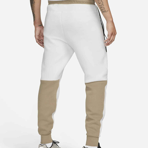 Pantalon de survêtement en molleton blanc pour homme avec empiècements latéraux beiges, taille élastique et cordon de serrage, style décontracté, idéal pour l'automne - Product Image 2