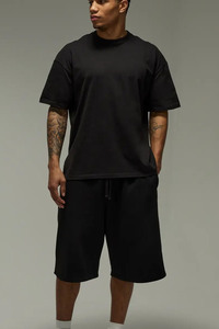 T-shirt en coton noir surdimensionné pour homme, manches courtes, col rond, décontracté, jersey uni, design simple, coupe ajustée - Product Image 4