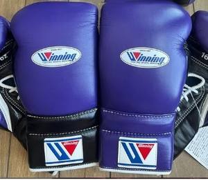 Gants de boxe de qualité pour l'entraînement, les séances de gym, le sparring, offrant confort, soutien des poignets, absorption des chocs et équilibre. - Product Image 4