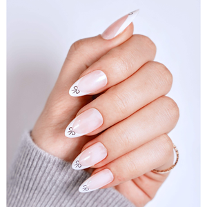 Lot de faux ongles à presser en ABS, style français élégant et minimaliste, avec nœud et décoration dorée, longueur amande, couleur nude, usine OEM - Product Image 1