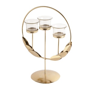 Candelabro Dorado Opulento de Hierro Hecho a Mano, Ecológico y Duradero, con Tres Portavelas de Vidrio y Diseño de Hojas para Decoración del Hogar - Product Image 1