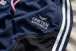 ONETEN APPARELS Conjunto Deportivo Azul Marino para Mujer OA-80, Pantalones Deportivos 100% Poliéster con Rayas Blancas y Diseño del Número 80 - Product Image 2