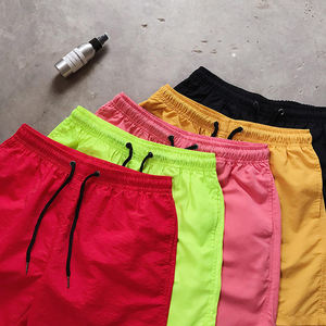 กางเกงขาสั้นชายหาดผ้าแคนวาสสีพื้นสำหรับผู้ชายขายส่ง ซับในนุ่ม เอวยางยืด กันน้ำ แห้งเร็ว - Product Image 4