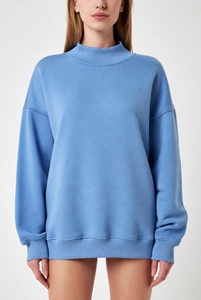 Stylish woman in bright bubblegum <b>pink</b> mockneck <b>sweatshirt</b> featuring elegant lace details on neckline and hem with oversized rel - Product Image 5
