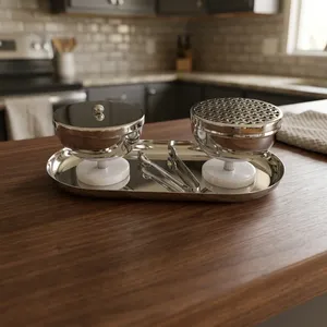 Ensemble de brûleurs d'encens luxueux en argent, surélevés par des bases élégantes en résine, accompagnés de couvercles en maille et d'une pince de service sur un plateau assorti. - Product Image 2