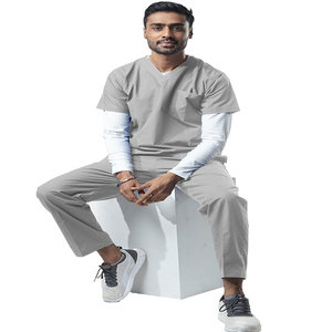 Conjuntos de uniformes de hospital transpirables de alta calidad, chaqueta de lona de manga corta Unisex para uso en salón de belleza - Product Image 1