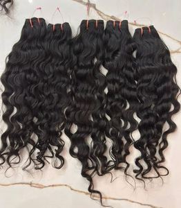 Perruque de cheveux naturels indiens bruts ondulés de 10 à 32 pouces, haute densité, noirs naturels, doux, soyeux et durables - Product Image 1
