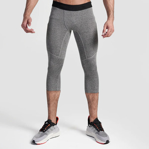 Leggings de compression pour hommes, de haute qualité, pour l'entraînement et le fitness, taille élastique, séchage rapide, noir et blanc, vente en gros sur mesure - Product Image 1