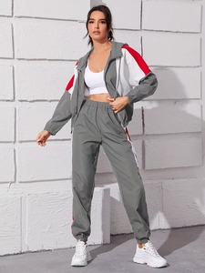 Female <b>Lightweight</b> Woven Running Sportswear Outfit | Geometric Block Activewear Wind <b>Jacket</b> and Tapered Trousers Co ord - Product Image 1