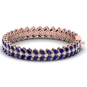 กำไลเทนนิส REYES ผลิตตามสั่ง ทองคำแท้ 14K ประดับเพชรโมอิสซาไนต์ทรงรี รับรองโดย GRA พร้อมพลอยไพลินสีน้ำเงิน 17 กะรัต - Product Image 2