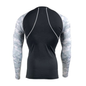 เสื้อรัดกล้ามเนื้อสำหรับออกกำลังกายในยิมและการฝึกซ้อม MMA ที่สวมใส่สบายด้วยผ้าระบายอากาศได้ดี กระชับพอดีตัวและยืดหยุ่นได้ - Product Image 4