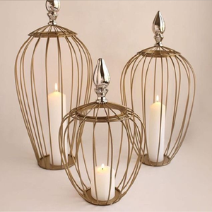 Elegant gold multi-tier candle holder with a twisted <b>ribbon</b> stem design. Perfect modern tabletop accent. Available at wholesale - Product Image 4