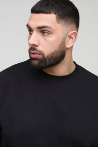 Sweat-shirt à col rond noir pour homme avec poches utilitaires et pantalon cargo assorti, ensemble de survêtement, vêtements en gros OEM ODM - Product Image 3