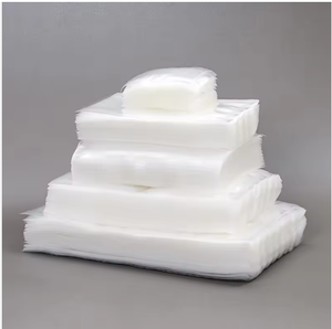Rouleau de sacs sous vide en PE de qualité alimentaire, transparent, gaufré, résistant à l'humidité, thermoscellable, largeur personnalisée pour l'emballage des aliments secs - Product Image 1