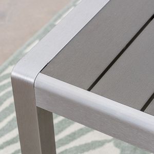 Table de repas d'extérieur Coral avec structure en aluminium et plateau en imitation bois finition grise - Product Image 4