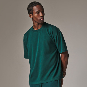 T-shirt en coton uni surdimensionné pour homme, col rond, manches courtes, couleur unie, coupe décontractée à épaules tombantes, vente en gros - Product Image 5