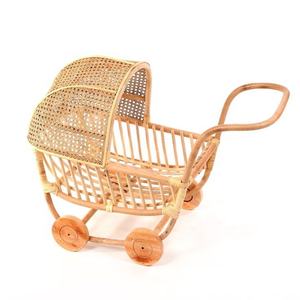 Traditional Handwoven Natural Rattan Toy Vintage Wicker Doll Stroller Wooden Wheels Toddler Walker Play Item - Product Image 1