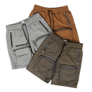 Venta al por mayor de fábrica nuevo estilo utilidad Cargo hombres medio pantalones cargo pantalones cortos OEM bolsillos con cremallera al por mayor pantalones cortos personalizados hombres desgaste - Product Image 1