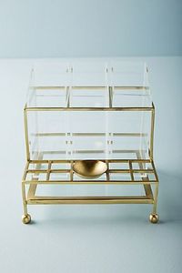 Soporte cosmético de metal y vidrio de alta calidad diseñado para guardar lápices labiales, bases, cremas y artículos de belleza esenciales. - Product Image 4