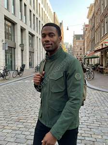 Veste de chasse tactique multifonctionnelle OEM en tissu Oxford imperméable avec des sacs de rangement de grande capacité et des passants pour équipement utilitaire - Product Image 2