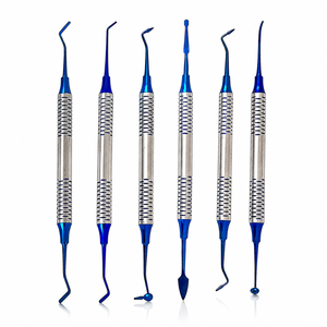 Spatule de restauration dentaire en acier inoxydable allemand, double extrémité, antiadhésive, pour résine composite, finition titane bleu - Product Image 1