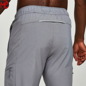 Pantalones cortavientos personalizados al por mayor para hombre, ajustados, 100% poliéster, nailon, pantalones cortavientos para hombre - Product Image 3