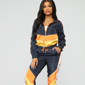 ชุดวอร์มผู้หญิงคุณภาพสูง ผลิตในปากีสถาน ทรงหลวม กันลม แบบครอป ขายดี สีพื้น บริการ OEM ชุดออกกำลังกายขายาว - Product Image 1