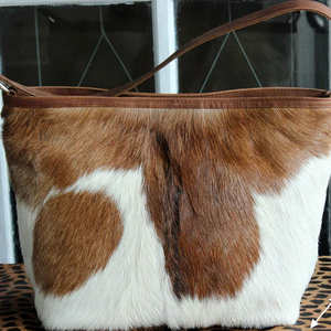 กระเป๋าถือหนังวัวแท้สำหรับผู้ชาย ดีไซน์เนอร์แฟชั่น ราคาประหยัด น้ำหนักเบา ปิดด้วยซิป ความจุ 1-1.9 ลิตร - Product Image 4