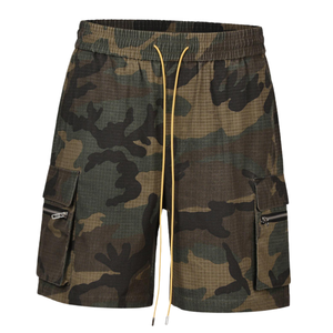 กางเกงขาสั้นลำลองผู้ชายทรงปกติ ผ้าแคนวาสคอตตอน 100% แห้งเร็ว ระบายอากาศได้ดี เอวกลาง มีเชือกผูก สีพื้น เป็นมิตรกับสิ่งแวดล้อม - Product Image 1