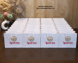 Wholesale White <b>Paper</b> Carry Bags with Custom Logo Luxury Retail Shopping Gift Packaging Bags for Clothing Stores - Product Image 2