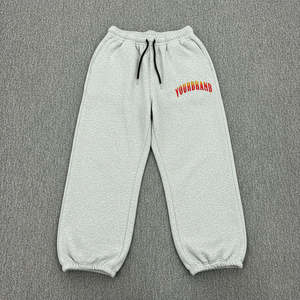 กางเกงจ็อกเกอร์ทรงหลวมสไตล์แบ็กกี้สำหรับผู้หญิง OEM ODM  รับทำโลโก้ กางเกงขายาวทรงโอเวอร์ไซส์พร้อมเชือกผูกเอว กางเกงผ้าฝ้ายสำหรับผู้หญิง - Product Image 1