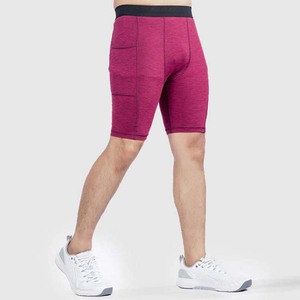 Shorts de sport pour homme, couleur unie, avec poches, séchage rapide, taille élastique, tricotés en spandex et polyester, shorts de sport - Product Image 1