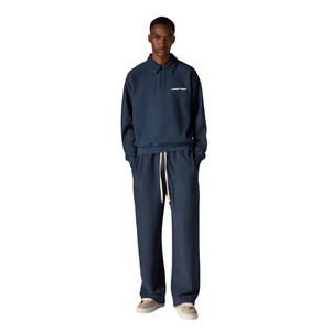 Conjunto de chándal de dos piezas para hombre al por mayor con cremallera de un cuarto, sudadera con logotipo personalizado y pantalones de pierna recta de ajuste relajado - Product Image 1