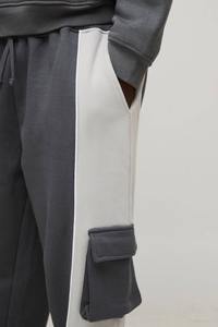 กางเกงวอร์มผู้ชายสไตล์สตรีทคุณภาพสูง ผ้าฟลีซนุ่ม แต่งสีบล็อก ตะเข็บเย็บอย่างดี เอวผูกเชือก ทรงตรง ลายเรียบ สำหรับออกกำลังกาย - Product Image 5