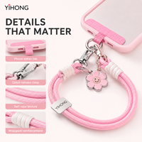 Vente en gros usine, populaire à l'international : Lanière de téléphone portable Hello Kitty, pendentif de sac court, sangle de poignet tressée à double clip