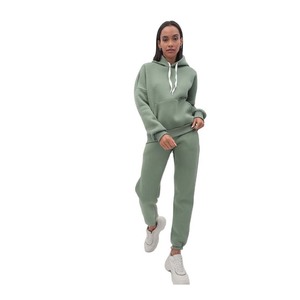 Conjuntos deportivos de color sólido personalizados para mujer, estilo oversize con bolsillo. - Product Image 1