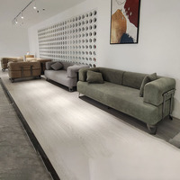Canapé modulaire sectionnel moderne vert neutre avec structure métallique robuste, coussins en mousse haute densité et 2 oreillers