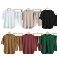 Ensemble décontracté élégant pour homme, col rond, manches courtes, couleur unie, tissu tricoté, impression sérigraphique personnalisée avec logo OEM, en stock