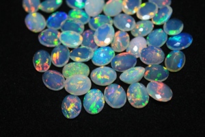 <b>7</b>*9mm White Opal Gemstone Oval Faceted Cut Super Fine Quality - Product Image 2
