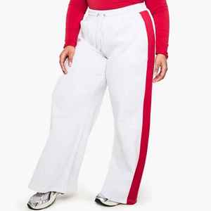 Pantalon de jogging ample et respirant X Sports City pour femme, coupe harem, avec bande latérale rouge, idéal pour l'hiver et conçu pour les grandes tailles - Product Image 1