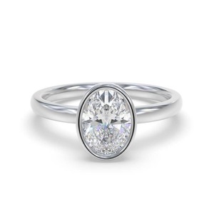 Oval Diamond Bezel <b>Set</b> Solitaire <b>Ring</b> 0.30 Ct Lab Grown Diamond In 18K <b>Gold</b> And Platinum - Product Image 1