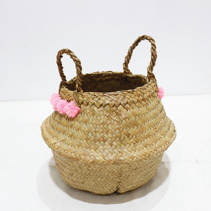 Cesta de Almacenamiento Circular de Hojas de Palma Naturales, Cesto de Ropa con Pompones Rosas, Ecológico, Multifuncional y Duradero - Product Image 2