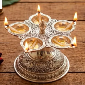 <b>Silver</b> Plated 5 Face Panch akhand Diya Stand with Engraved Peacock Pattern Base available at wholesale prices. - Product Image 1