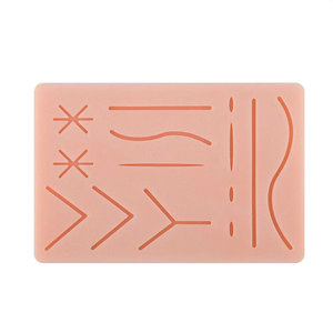 Suture <b>Practice</b> <b>Pad</b> Veterinary Students 14 Pre Cut Wounds with Rip Resistant Mesh Layer Tear Silicone Skin <b>Pad</b> Medic Instruments - Product Image 1