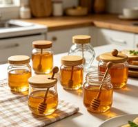 Pot à miel en verre minimaliste 2026 avec cuillère en bois, distributeur de miel hermétique transparent pour la cuisine et la table de petit-déjeuner