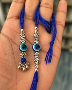 Rakhi ชุดมีตาสีฟ้าชั่วร้ายแฮนด์เมดดีไซเนอร์ rakhi สำหรับ Brother nazar Protection rakhi ประดับลูกปัดลูกปัดหินสีเงินสุดพิเศษ - Product Image 2