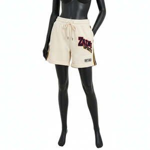 กางเกงบาสเก็ตบอลขาสั้นผู้หญิง ผ้าฟลีซโพลีเอสเตอร์พรีเมียม สีครีม เนื้อผ้านุ่ม แถบข้างผ้า แถบข้างผ้าลายทาง  โลโก้ปักแบบเชนิลล์ - Product Image 2