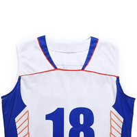 Tenue de volley-ball en tissu polyester respirant pour l'entraînement quotidien, absorption de la transpiration et mobilité facilitée pour les joueurs actifs
