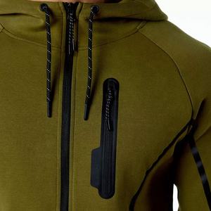 Pantalones activos ajustados de manga raglán de alta calidad personalizados para hombres, chándal de entrenamiento para correr con cremallera completa de Punchin Sports - Product Image 5